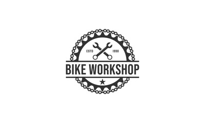 logo for bicycle repair shop with illustration of bicycle gear and repair tools