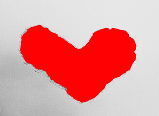 Naklejka na ściany i meble Red hole heart in white paper background