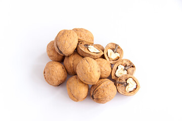 Walnuts in a shell on a white background. Healthy nuts.