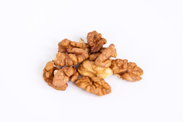 Walnuts without shells on a white background. Healthy nuts.