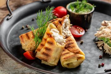 Turkish cuisine, Pacanga Boregi with pastirma and cheddar cheese. Pastirmali Borek. Delicious breakfast or snack. top view