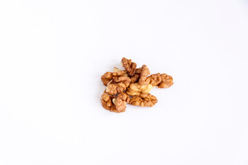 Walnuts without shells on a white background. Healthy nuts.