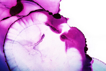 Abstract alcohol in background in pink, purple and blue tones.