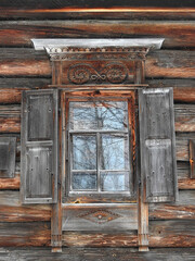 old wooden window with russian carving
