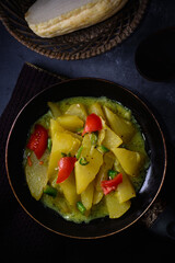 cooked chayote or chow chow dish on a pan, vegetarian dish on dark background, healthy sri lankan food