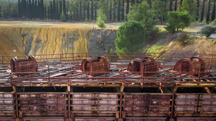 Old rusty trolleys ar abandoned Kokkinogia copper mine in Mitsero, Cyprus