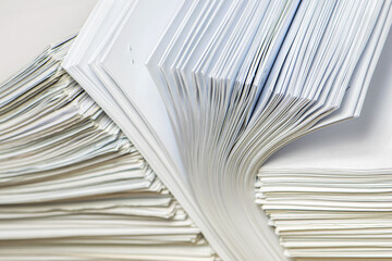 pile of paper documents in the office
