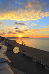 Public clock in Lyme Regis, Dorset at sunrise