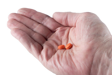 two red tablets with drug