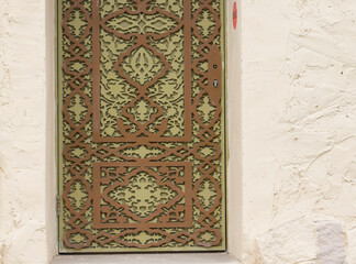 Beautiful door to the house in the Arabic style.