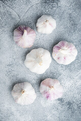 Fototapeta na wymiar Garlic Cloves and Bulb, on gray background, top view flat lay
