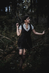 Witch in the form of a student in the forest