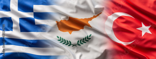Greece< Cyprus and Turkey flags blowing in the wind