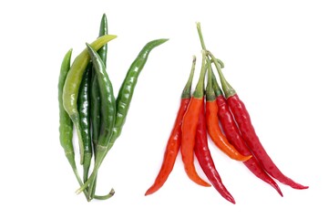 Red and green chili peppers on a white background.