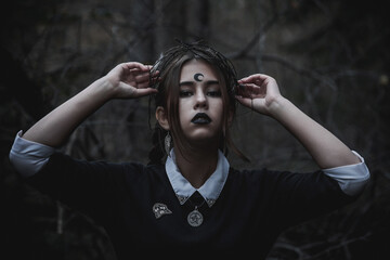 Witch in the form of a student in the forest