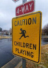 Yellow sign " caution children  playing "