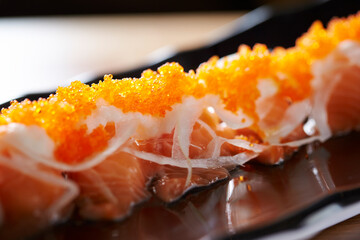 salmon sushi on a plate