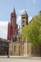 Fototapeta na wymiar Vrijthof, red tower and church in Maastricht
