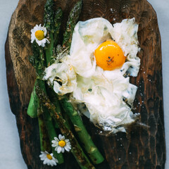 roast eeg with sparha on a wood dish