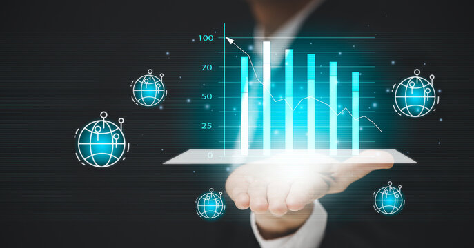 businessman holding graph line arrow with world icon on the graph stock market in graph Screen Icon of a media screen,Technology Process System Business with Investment and stock market concept - Powered by Adobe