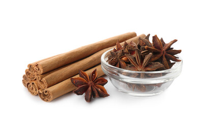 Aromatic cinnamon sticks and anise isolated on white