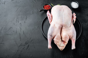 Recipe for cooking whole duck on black background, with space for text