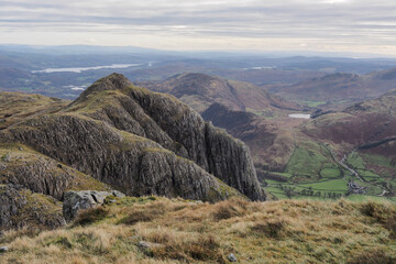 View to Loft Crag from Pike of Stickle overlooking the Great Langdale valley with Blea Tarn nestled...