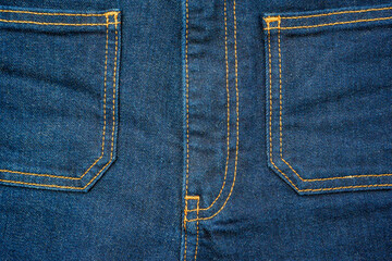 Fototapeta premium Blue jeans denim front pockets. Close up photo.