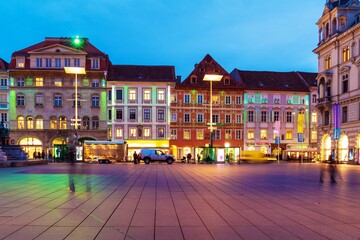Houses on Hauptplatz and Erzherzog Johann Brunnen  at night, Graz, Austria