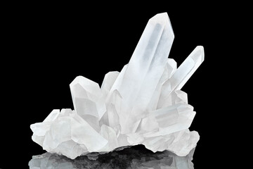 Amazing pure Quartz Crystal cluster gemstone closeup macro isolated on black background. Natural rare white mineral rough stone. Beautiful crystals arrangement