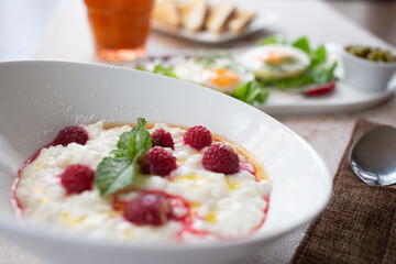 Rice porridge with raspberries