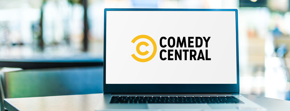 Laptop Computer Displaying Logo Of Comedy Central