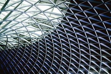 Modern building with curving roof and glass steel column