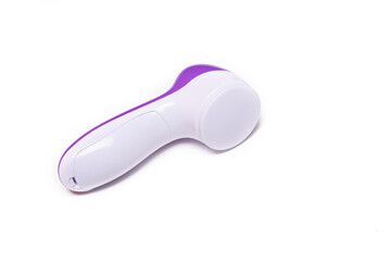 Electric isolate facial massager . Purple massager. Facial care. Cosmetology. Women's care . Article about the health of the face . . Copy space