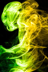 Colored smoke on black background