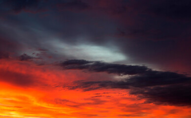 Clouds at sunset, amazing sky, nature background