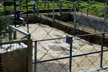 Station for sewage treatment behind a fence