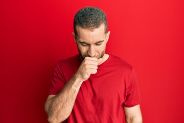 Young caucasian man wearing casual clothes feeling unwell and coughing as symptom for cold or bronchitis. health care concept. © Krakenimages.com