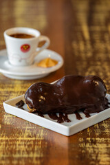 Chocolate eclair with coffe.