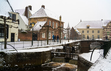 Street scene with  weir in the river in the city center of Amersfoort, Netherlands

