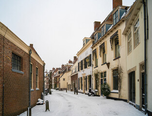 Street scene while snowing in the city center of Amersfoort, Netherlands

