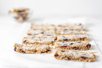 Vegan Energy Oat Bars With Coconut, Rice Puffs and Dried Cranberries Fruits, Flat Lay