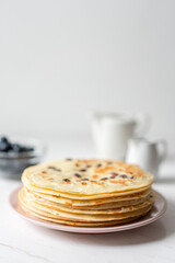 French Pancakes With Raisins served with Butter and Maple Syrup, Morning Breakfast