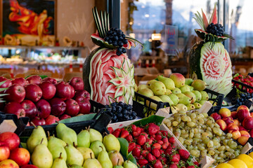 Open buffet full of delicious fruits with orange, grape, watermelon