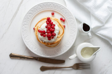 American Peanut Pancakes with Cranberries, Maple Syrup and Yoghurt , Morning Flat Lay