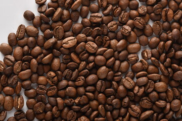 Coffee beans isolated on white background with copy space for text. Coffee background or texture...