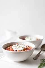 Vegetable Chili Bean Stew With Red Kidney Beans, Tomatoes, Sweetcorn, Red and Yellow Peppers On Flat Lay