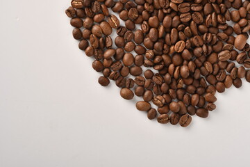 Coffee beans isolated on white background with copy space for text. Coffee background or texture concept.