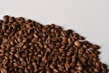 Coffee beans isolated on white background with copy space for text. Coffee background or texture concept.