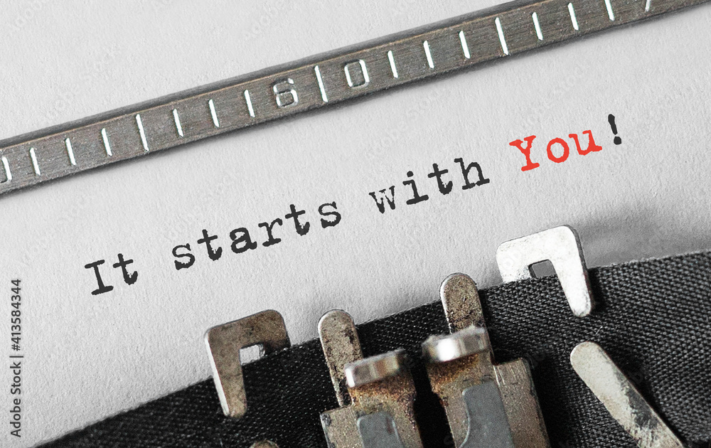 Aufkleber Text It starts with You typed on retro typewriter